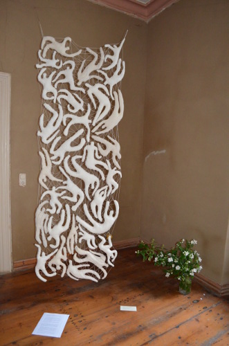 Teppich Figuren im Netz